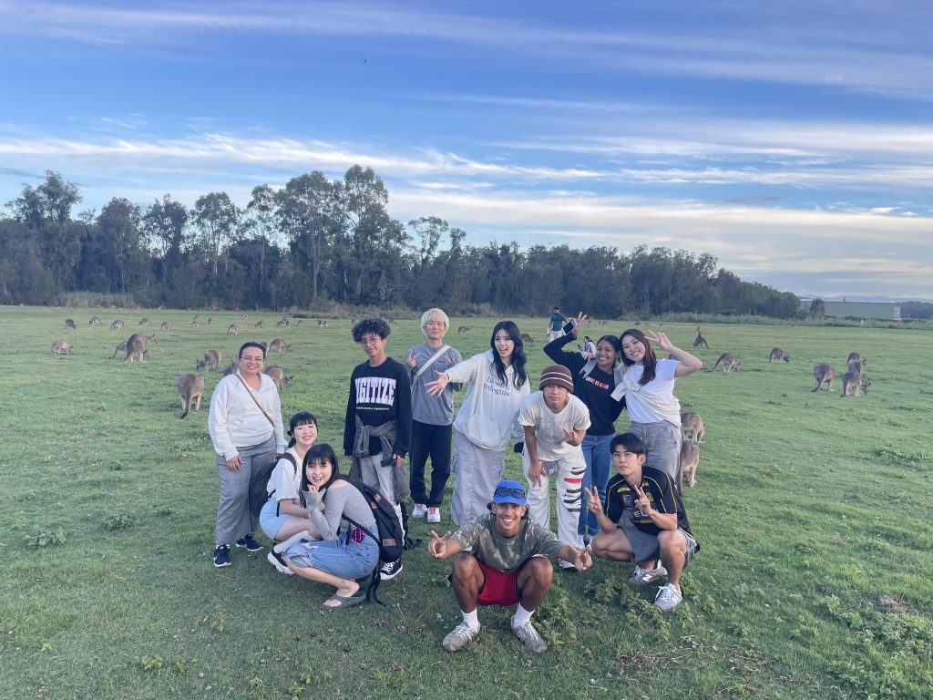 students with kangaroos in Australia